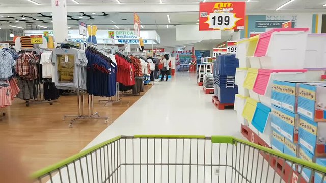 Shopping wagon cart in supermarket time lapse