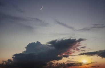 Full moon background  . Red sunset and moon . Glowing sunset and full moon  . Dramatic nature background . Religion background . The moon against the background   