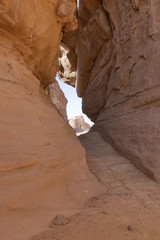 Madain Saleh through a gap in the rock