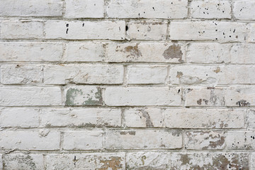Fototapeta premium Brick texture with scratches and cracks