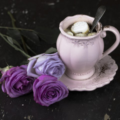 A cup of coffee with marshmallow for breakfast