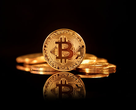 Bitcoin BTC the new virtual internet Cryptocurrency isolated on black background.