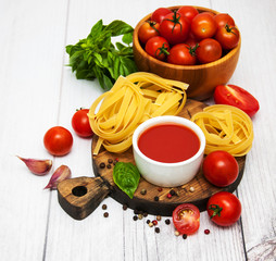 Bowl with tomato sauce