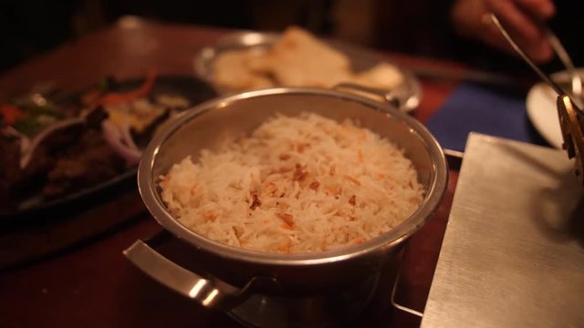 Bowl of basmati rice in Indian restaurant.