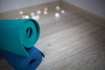 colorful yoga mats are on the floor