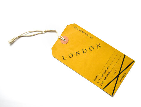 Vintage yellow luggage label