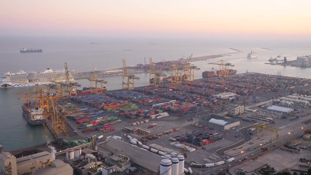 Industrial port Barcelona: containers, cranes and robots.