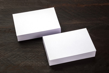 Photo mockup of two white business card stacks