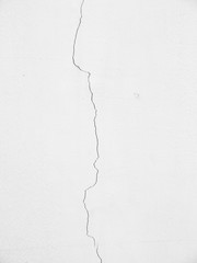 white wall with cracks