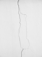 white wall with cracks