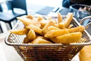Golden French fries potatoes ready to be eaten