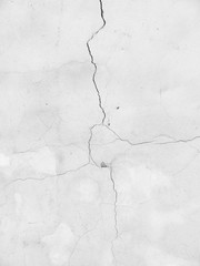 white wall with cracks
