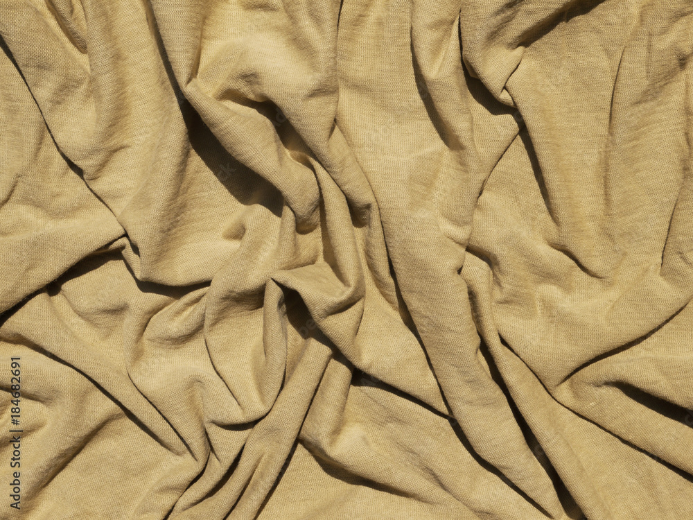 Poster brown fabric crumpled texture background, material of textile industrial