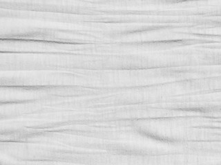 Crumpled white fabric cloth texture