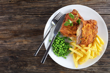 Cordon Blue with French fries, green peas
