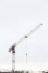 Crane is used in the construction of buildings.