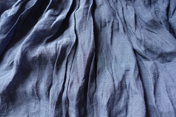 Rippled thin blue cotton and polyester fabric