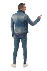 Fototapeta premium man dressed with blue jeans isolated on white background