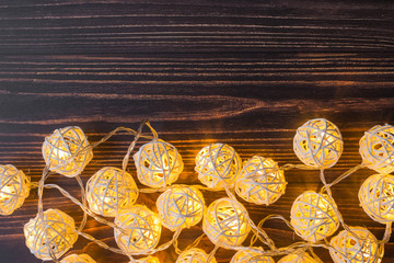 Fototapeta na wymiar Glowing Christmas garlands round balls