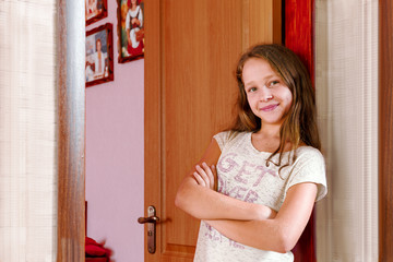 the teenager at the door of his room