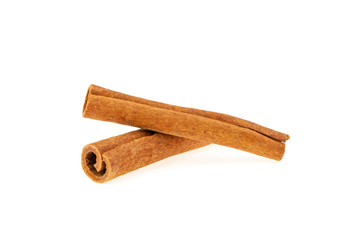 two cinnamon sticks isolated on white background