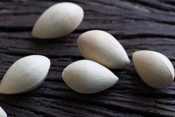 Fototapeta na wymiar Ginkgo biloba (seeds) on the background wood.