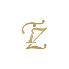 Initial letter TZ, overlapping elegant monogram logo, luxury golden color