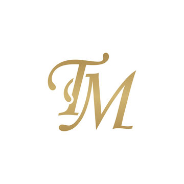 Initial letter TM, overlapping elegant monogram logo, luxury golden color