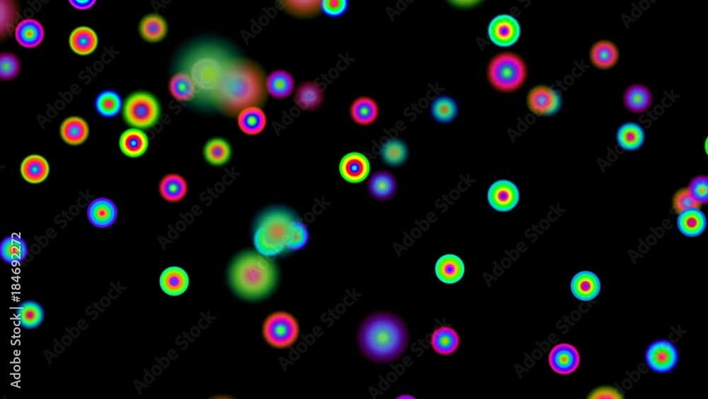 Poster rotating particles changing color. depth of field. seamless loop.