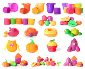 Different figures of play dough on white background