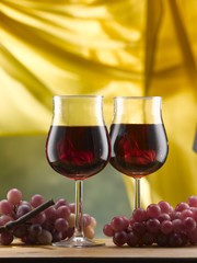 red wine stem glasses served with grapes