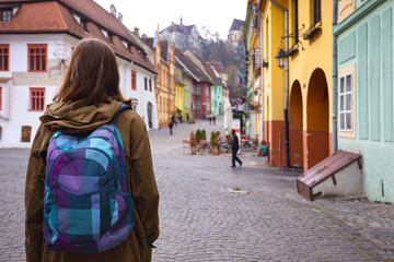 girl hipster walking at the beautiful street