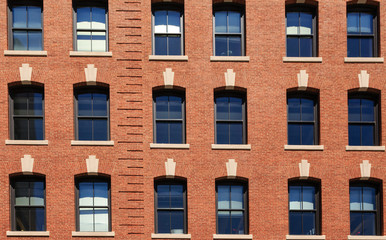 Archstones Over Windows in Traditional Brick Building