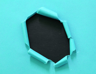torn paper isolated on black background