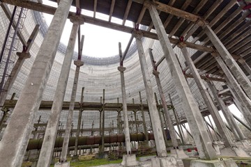 Futuristic view inside of cooling tower of unfinished Chernobyl nuclear power plant