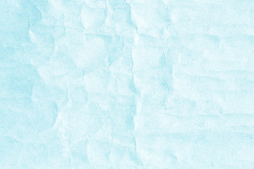 Crumpled light blue paper texture