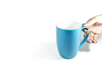 hand holding mug, blue mug/Coffee cup made of glazed porcelain