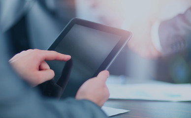 Businessman holding digital tablet