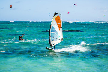Windsurfers on the Le Morne beach in Mauritius - obrazy, fototapety, plakaty