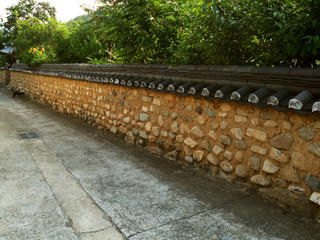 Obraz premium Stone wall of Hanok. Hanok is traditional Korean-style house