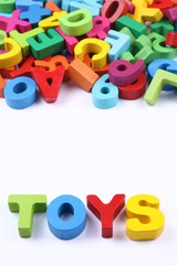 Naklejka premium Colorful blocks of alphabets and numbers as toys for child development