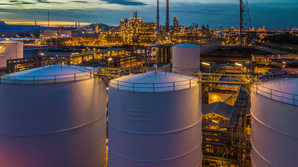 Aerial view oil terminal is industrial facility for storage of oil and petrochemical products ready...