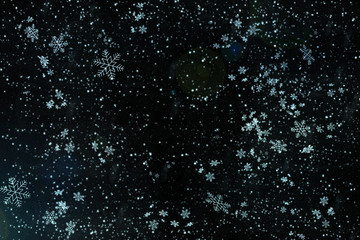 Blue Christmas background snow texture, abstraction, white snowflakes. Christmas background, winter...