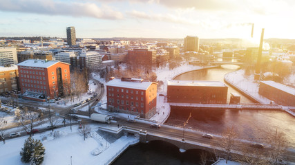 Aerial panoramic view of Tampere city center at sunset, Finland at winter