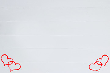 Obraz premium valentines day. White wood background with red heart, copy space, top view
