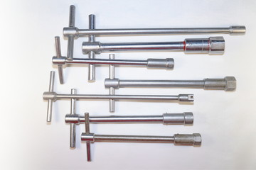 tools for work, end wrenches in different positions on a white background