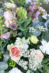 Wedding floral decorations with roses, lillies, dahlias and carnations.