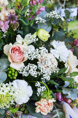 Wedding floral decorations with roses, lillies, dahlias and carnations.