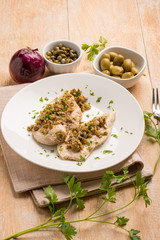chicken fillet with capers green olives and onions