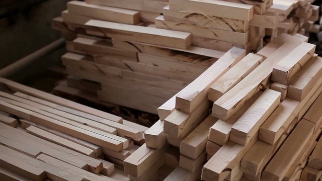 manufacture of upholstered furniture. Warehouse space. Timber industry objects. Finished wood beams or plank at a warehouse.